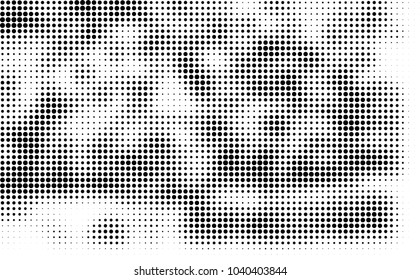 Grunge halftone is black and white. Abstract texture of dots for printing and design