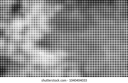 Grunge halftone is black and white. Abstract texture of dots for printing and design