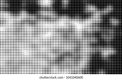 Grunge halftone is black and white. Abstract texture of dots for printing and design