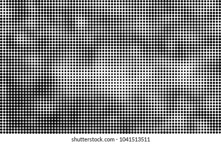 Grunge halftone is black and white. Abstract texture of dots for printing and design