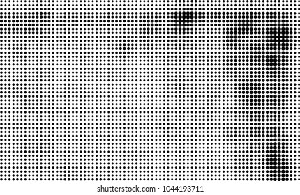Grunge halftone is black and white. Abstract texture of dots for printing and design