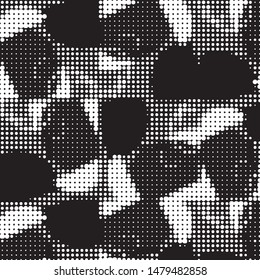 Grunge halftone black and white dots texture background. Spotted vector Abstract Texture