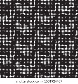 Grunge halftone black and white dots texture background. Spotted vector Abstract Texture