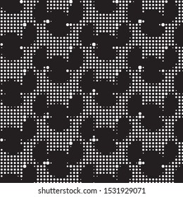 Grunge halftone black and white dots texture background. Spotted vector Abstract Texture