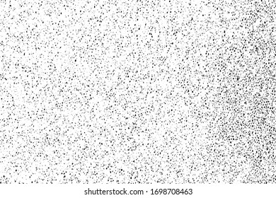 Grunge halftone texture of foam rubber. Monochrome background of chaotic spots, noise and grain. Overlay template. Vector illustration