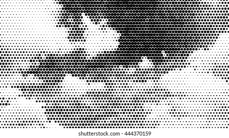 Grunge halftone vector background.Halftone dots vector texture