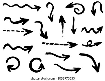 Grunge hand drawn vector arrows. Dry brush strokes