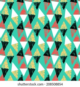 Grunge hand painted abstract pattern with bold textured triangles in bright multiple colors, seamless vector.