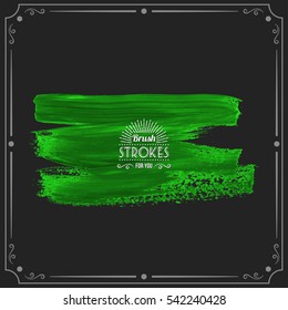Grunge hand - painted brush stroke on a dark background. Expressive vector element for design.