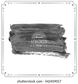 Grunge hand - painted brush stroke on a light background. Expressive vector element for design.