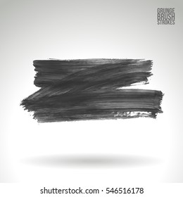 Grunge hand - painted brush stroke on a light background. Expressive vector element for design.