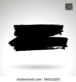 Grunge hand - painted brush stroke on a light background. Expressive vector element for design.