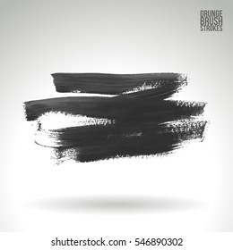 Grunge hand - painted brush stroke on a light background. Expressive vector element for design.