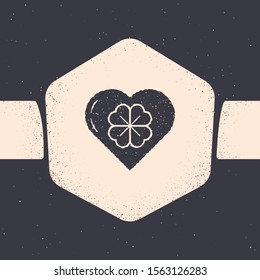 Grunge Heart with four leaf clover icon isolated on grey background. Happy Saint Patrick day. Monochrome vintage drawing. Vector Illustration