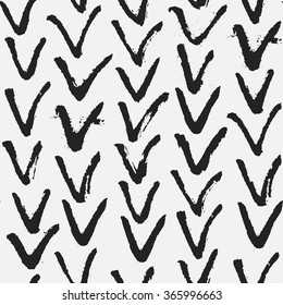 Grunge herringbone pattern in black and white. Monochrome vector seamless pattern. Abstract hand drawn background with brushed V symbol.