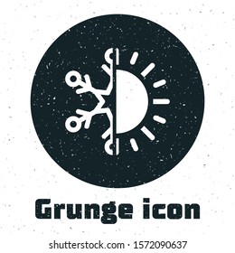 Grunge Hot and cold symbol. Sun and snowflake icon isolated on white background. Winter and summer symbol.  Vector Illustration