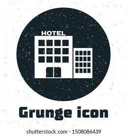 Grunge Hotel building icon isolated on white background.  Vector Illustration