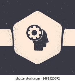 Grunge Human head with gear inside icon isolated on grey background. Artificial intelligence. Thinking brain sign. Symbol work of brain. Monochrome vintage drawing. Vector Illustration