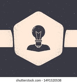 Grunge Human head with lamp bulb icon isolated on grey background. Monochrome vintage drawing. Vector Illustration