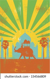 Grunge India background - man riding elephant at sunrise