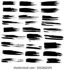 Grunge ink brush strokes set. Freehand black brushes. Handdrawn dry brush black smears. Modern vector illustration.