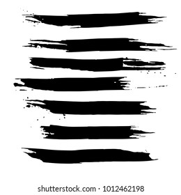 Grunge ink brush strokes set. Freehand black brushes. Handdrawn dry brush black smears. Modern vector illustration.