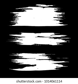 Grunge ink brush strokes set. Freehand black brushes. Handdrawn dry brush black smears. Modern vector illustration.
