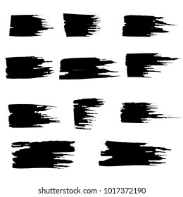 Grunge ink brush strokes set. Freehand black brushes. Handdrawn dry brush black smears. Modern vector illustration.