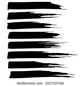 Grunge ink brush strokes set. Freehand black brushes. Handdrawn dry brush black smears. Modern vector illustration.
