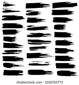 Grunge ink brush strokes set. Freehand black brushes. Handdrawn dry brush black smears. Modern vector illustration.