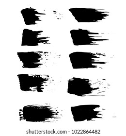 Grunge ink brush strokes set. Freehand black brushes. Handdrawn dry brush black smears. Modern vector illustration.