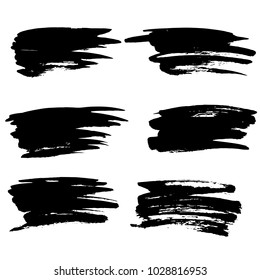 Grunge ink brush strokes set. Freehand black brushes. Handdrawn dry brush black smears. Modern vector illustration.
