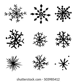 Grunge ink snowflakes; vector set