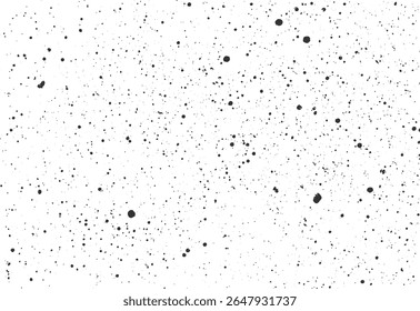 Grunge ink splatter texture background with scattered black drops. Artistic abstract splash spray for vintage surface design. High detail pattern.
