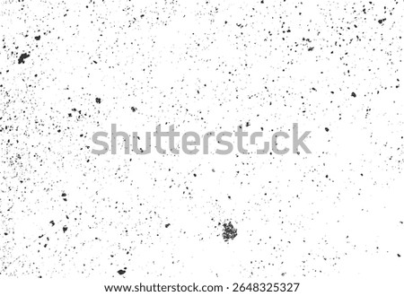 Grunge ink splatter texture with scattered black dots and dirty speckle effect. Abstract grain dust background. Vintage noise overlay.
