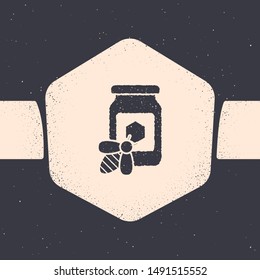 Grunge Jar of honey with bee icon isolated on grey background. Sweet natural food in bank. Honeybee or apis with wings symbol. Flying insect. Monochrome vintage drawing. Vector Illustration