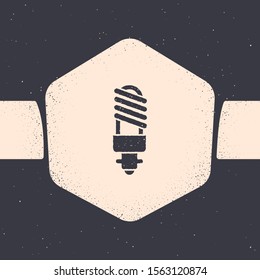 Grunge LED light bulb icon isolated on grey background. Economical LED illuminated lightbulb. Save energy lamp. Monochrome vintage drawing. Vector Illustration