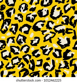 Grunge leopard print. Wild seamless pattern. Yellow hand drawn background.