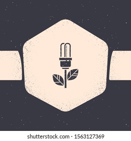 Grunge Light bulb with leaf icon isolated on grey background. Eco energy concept. Alternative energy concept. Monochrome vintage drawing. Vector Illustration