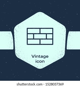 Grunge line Bricks icon isolated on blue background. Monochrome vintage drawing. Vector Illustration