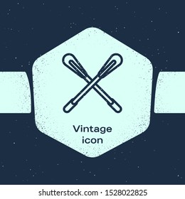 Grunge line Crossed paddle icon isolated on blue background. Paddle boat oars. Monochrome vintage drawing. Vector Illustration