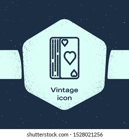 Grunge line Deck of playing cards icon isolated on blue background. Casino gambling. Monochrome vintage drawing. Vector Illustration