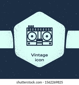 Grunge line DJ remote for playing and mixing music icon isolated on blue background. DJ mixer complete with vinyl player and remote control. Monochrome vintage drawing. Vector Illustration