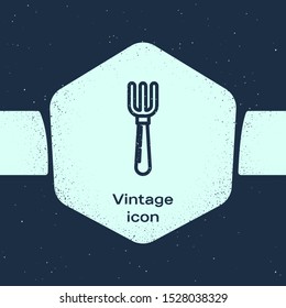 Grunge line Fork icon isolated on blue background. Cutlery symbol. Monochrome vintage drawing. Vector Illustration