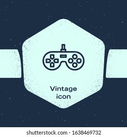 Grunge line Gamepad icon isolated on blue background. Game controller. Monochrome vintage drawing. Vector Illustration