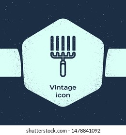 Grunge line Garden rake in work icon isolated on blue background. Tool for horticulture, agriculture, farming. Ground cultivator. Monochrome vintage drawing. Vector Illustration