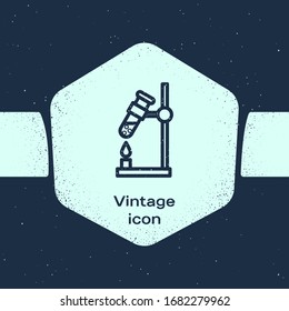 Grunge line Glass test tube flask on fire heater experiment icon isolated on blue background. Laboratory equipment. Monochrome vintage drawing. Vector Illustration