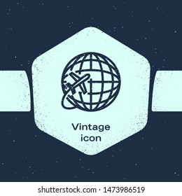Grunge line Globe with flying plane icon isolated on blue background. Airplane fly around the planet earth. Aircraft world icon. Monochrome vintage drawing. Vector Illustration