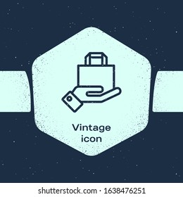 Grunge line Hand and paper shopping bag icon isolated on blue background. Package sign. Monochrome vintage drawing. Vector Illustration