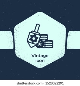 Grunge line Hanukkah dreidel and coin icon isolated on blue background. Monochrome vintage drawing. Vector Illustration